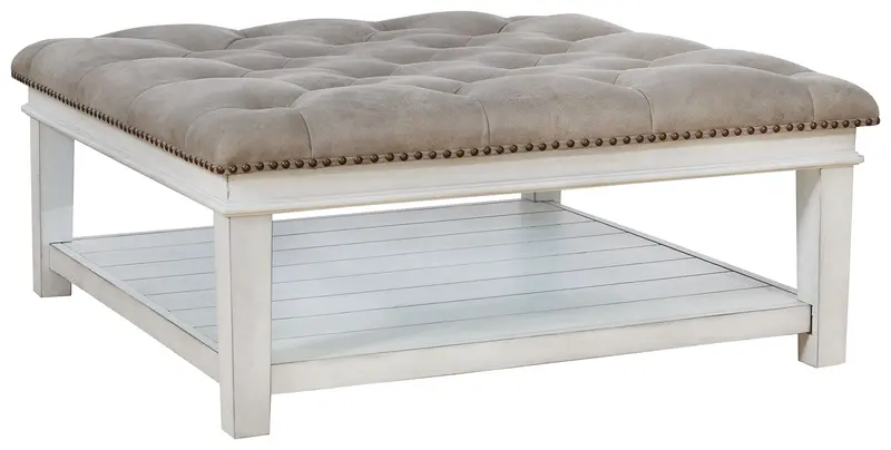 Kanwyn Whitewash Upholstered Ottoman Cocktail Table 1